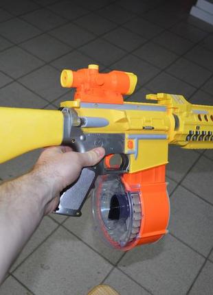 Іграшкова зброя nerf 009 бластер з барабаном для дітей із присосками4 фото