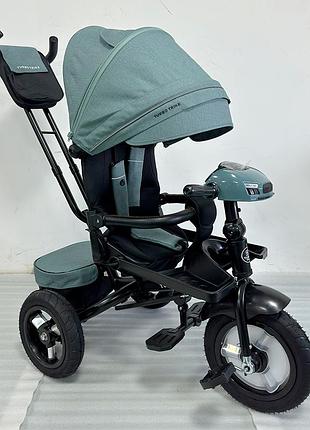 Дитячий триколісний велосипед — коляска turbo trike mt 1007-3 з батьківською ручкою м'ятний