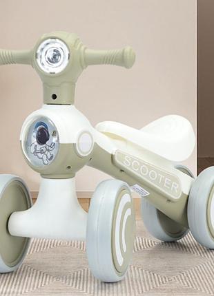 Дитяча каталка-толокар bambi m 5729 з підсвіткою і музикою бежевий