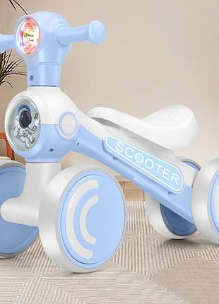 Дитяча каталка-толокар bambi m 5729 з підсвіткою і музикою блакитною