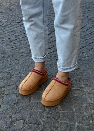 Тасс чорні та коричневі