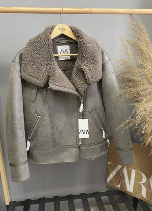 Дублянка мокко на хутрі на блискавці з поясом10 фото