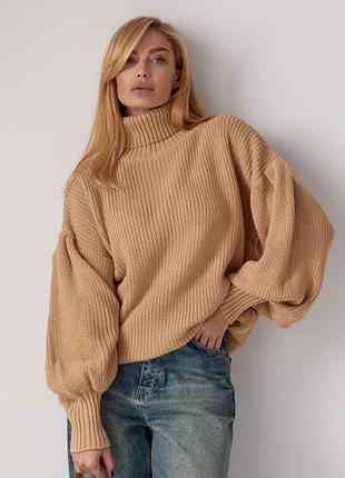 Женский вязаный свитер с пышными рукавами
