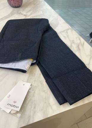 Брюки темно синього кольору