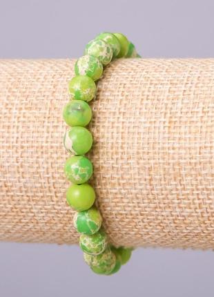Браслет з натурального каменю варисцит (прес) зелений кулька d-10мм обхват 18см на гумці