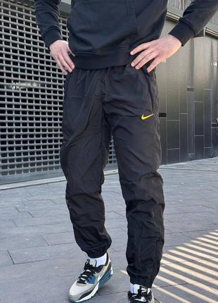Штани nike x drake nocta nrg woven track pants black yellow