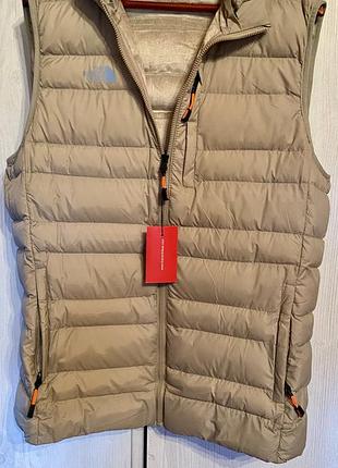 Тепла жилетка the north face