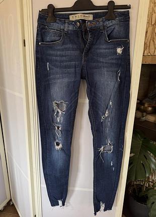 Джинсы рваные