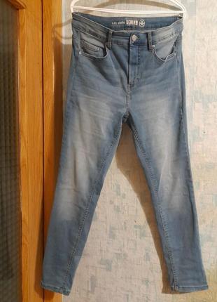 Стрейчеві джинси блакитні завужені з  ефектом " потертостей"  denim р 50