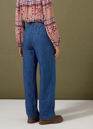 Роскошные широкие джинсовые брюки с поясом р.202 фото