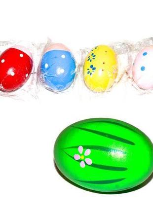 Дерев'яне яйце-брязкальце