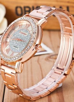 Женские наручные часы золотистые geneva розовое золото3 фото