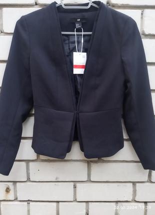 Піджак із підкладкою фірми н&м, країна виробник германію.