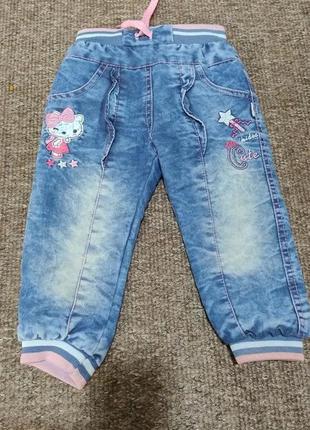 Теплые джинсы на девочку
