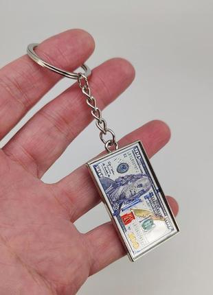 Брелок для ключів "100 доларів" колір — сріблястий арт. 05807