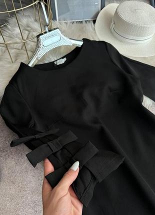 Сукня з бантиками