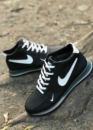 Зимові  черевики nike колір чорний, білий2 фото