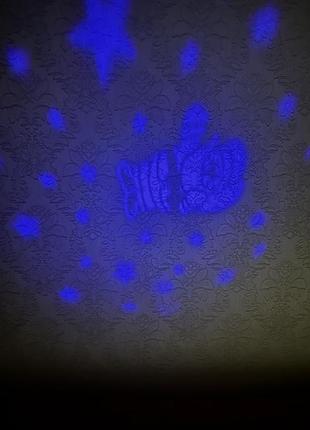 Нічник проектор зоряного неба санта клаус6 фото