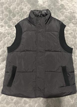 Жіноча жилетка