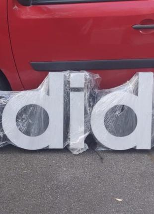 Вивіска з підсвіткою реклама фірми "adidas"