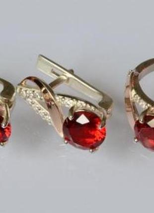 Серебряный комплект украшений с золотыми вставками