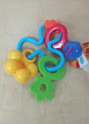 Погремушка-прорезыватель playgro цветочек3 фото