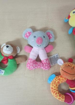 Погремушка-прорезыватель playgro цветочек8 фото