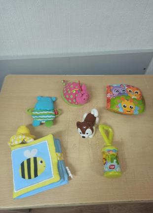 Погремушка-прорезыватель playgro цветочек10 фото