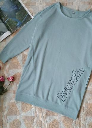 Свитшот удлиненный с кармашками