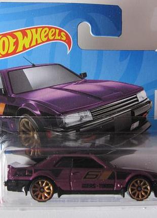 Машинка hot wheels nissan skyine rs