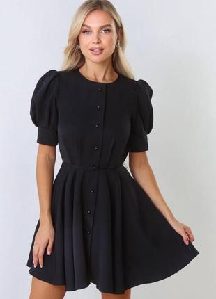 Мила сукня з пуговичками намистинками