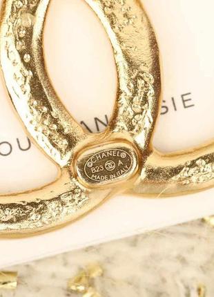 Брошка chanel 7