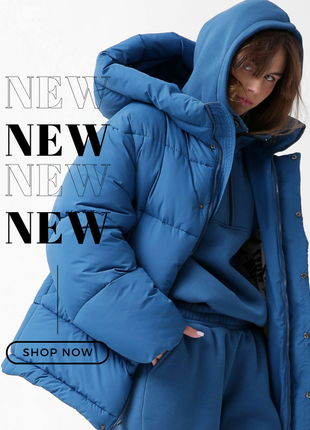 Стильний oversize пуховик кольору електрик