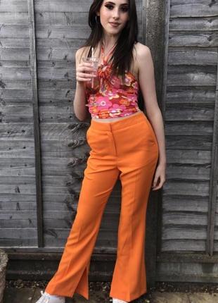 Брюки клеш оранжевые с разрезами, размер s (арт1440)