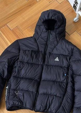 Зимовий пуховик nike acg