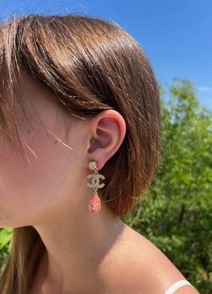 Сережки в позолоті з камінцями