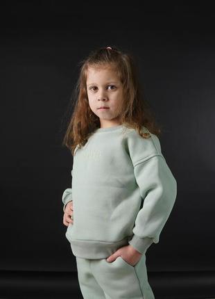 Теплые спортивные костюмы для девочек и парней.