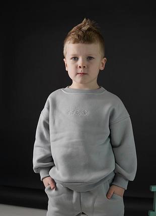 Теплые спортивные костюмы для девочек и парней.