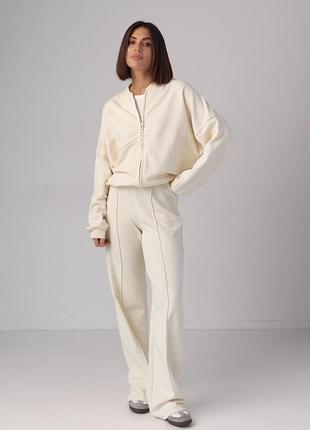 Жіночий трикотажний костюм з бомбером та прямими штанами - молочний колір, m (є розміри)1 фото