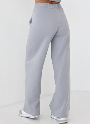 Утеплені трикотажні штани з кишенями — сірий колір, s (є розміри)2 фото