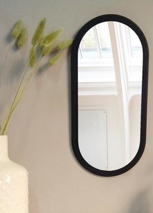 Стильное чёрное овальное зеркало на стену, небольшое узкое декоративное зеркало