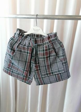 Круті шорти у клітку висока посадка з накладними кишенями