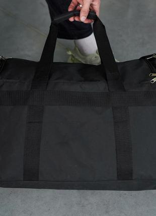 Дорожня сумка чорна reebok, чорне лого (велика)7 фото