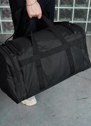 Дорожня сумка чорна reebok, чорне лого (велика)10 фото