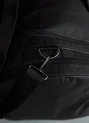 Дорожня сумка чорна reebok, чорне лого (велика)3 фото
