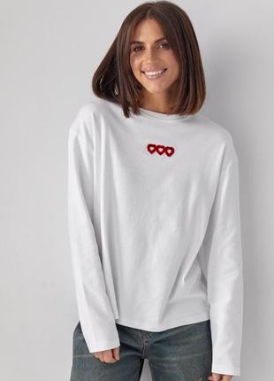 Жіночий лонгслів oversize прикрашений трьома серцями