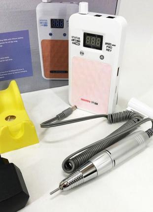 Портативный фрезер для ногтей nail drill yt-928 аккумуляторный с индикатором заряда на 35 000 оборотов. цвет:7 фото