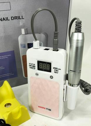 Портативный фрезер для ногтей nail drill yt-928 аккумуляторный с индикатором заряда на 35 000 оборотов. цвет:2 фото