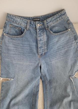 Крутые джинсы с разрезами5 фото