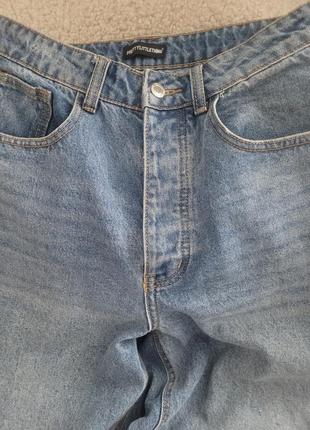 Крутые джинсы с разрезами7 фото